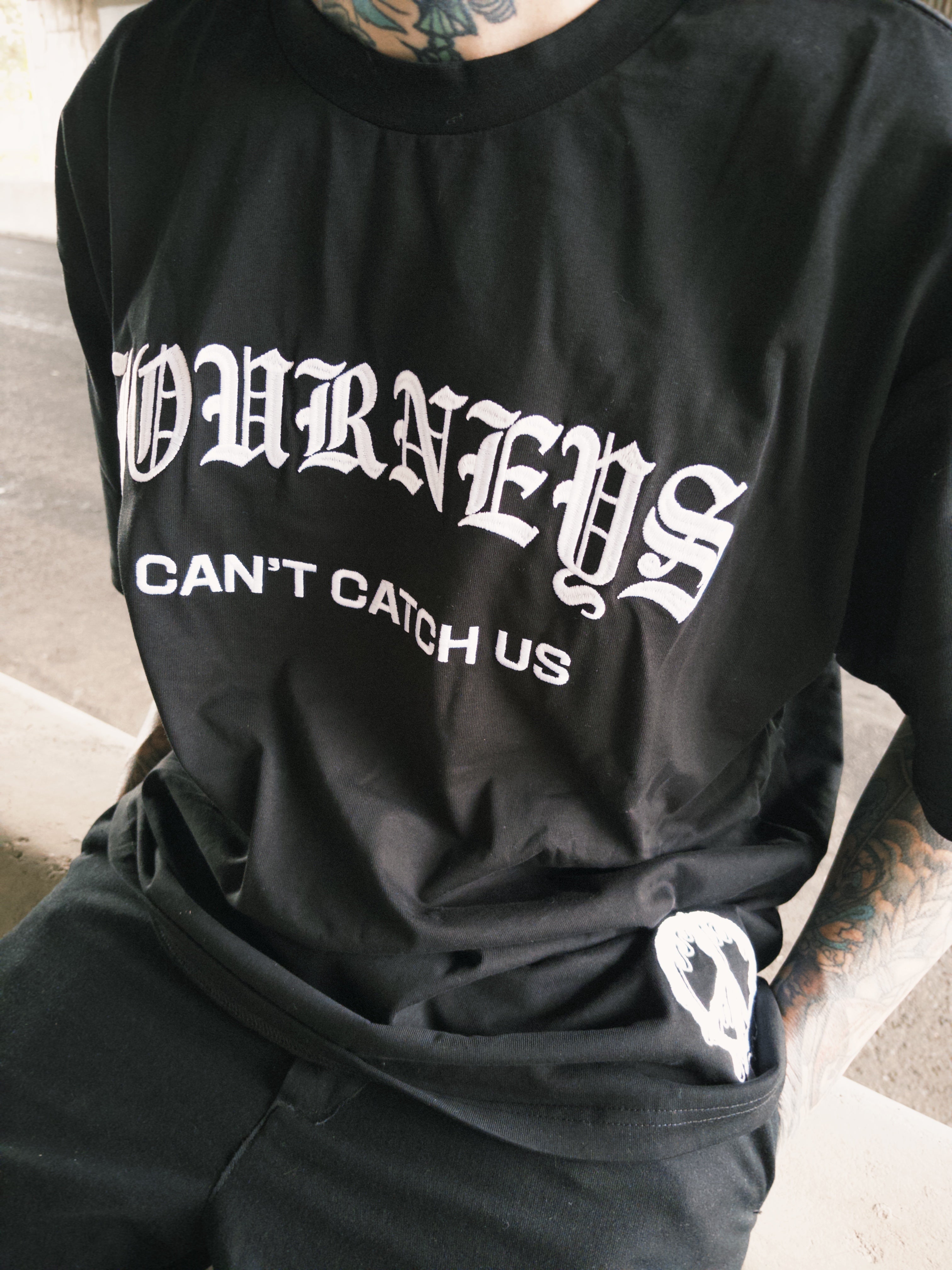 Can't Catch Us - Black Tee